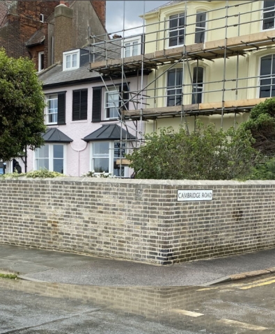 Large garden wall in Deal completely repointed with lime mortar. Cracks fixed and bricks repaired