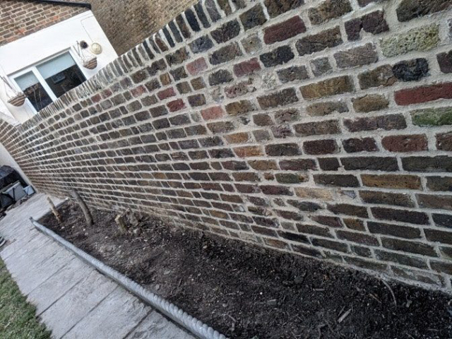Wonderful repointing of a graden wall in Canterbury